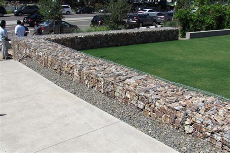 rock wall in metal box|How to Build a Gabion Wall (+ Pros and Cons) .